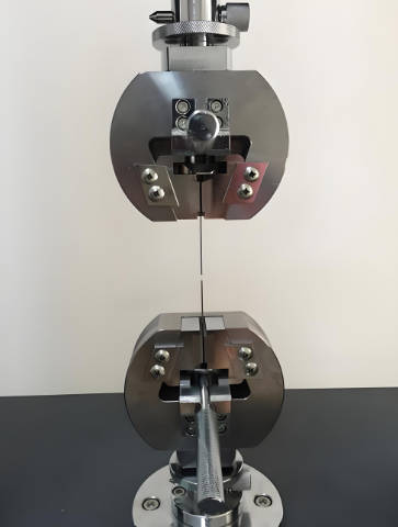 Tensile testing service for filament strands