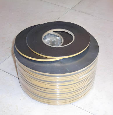Adhesive backed graphite corrugated tape detection